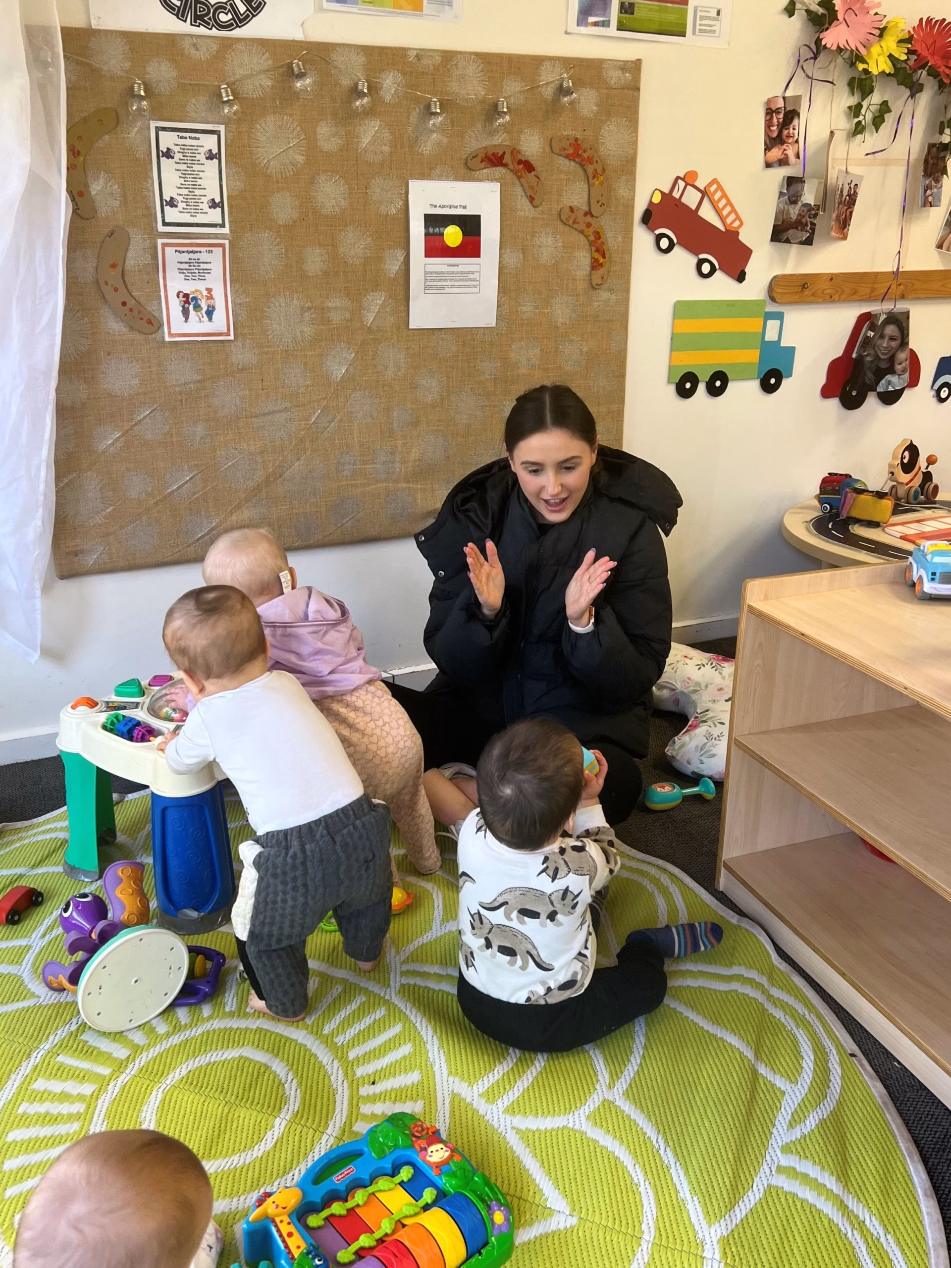 educator-with-children-portrait-scaled-e1790043148814.avif